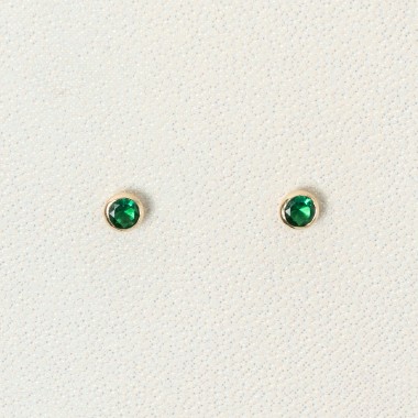 Topos con zircon verde...