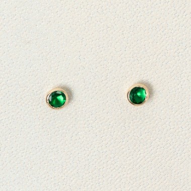 Topos con zircon verde...