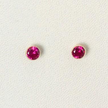 Topos con zircon fucsia 1gr...