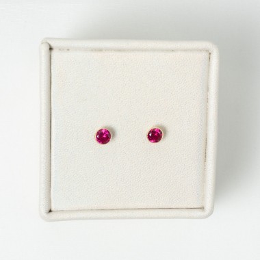 Topos con zircon fucsia 1gr...